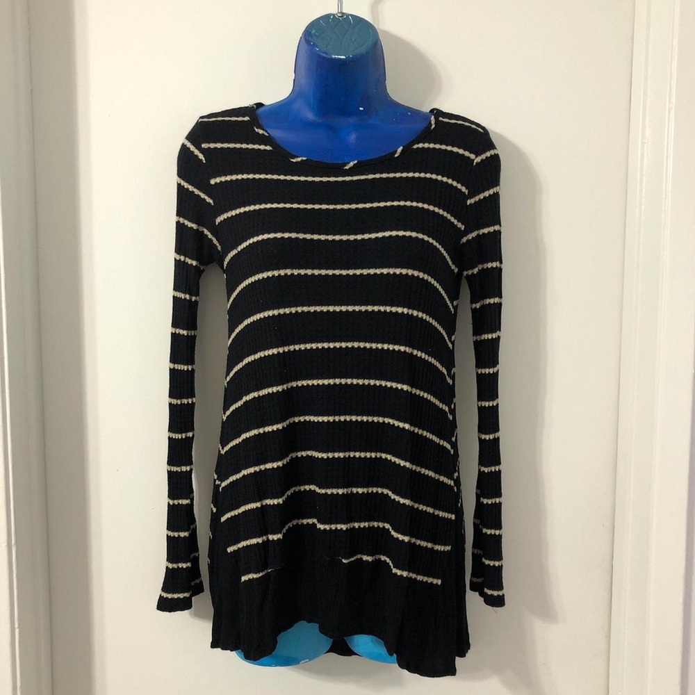Black and white striped sweater with a tunic style